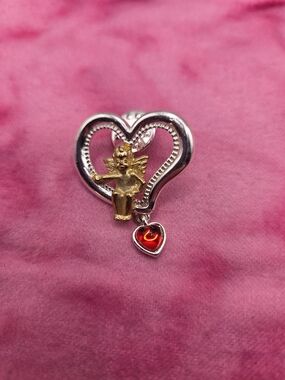 1060. Vintage Gold Tone And Silver Tone Cherub Heart Pendant with Heart Charm